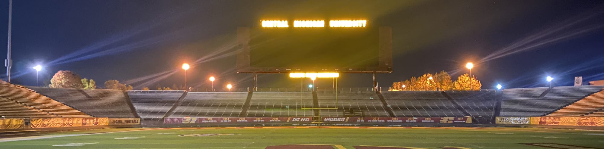 empty football stadium at night under the lights Albany
