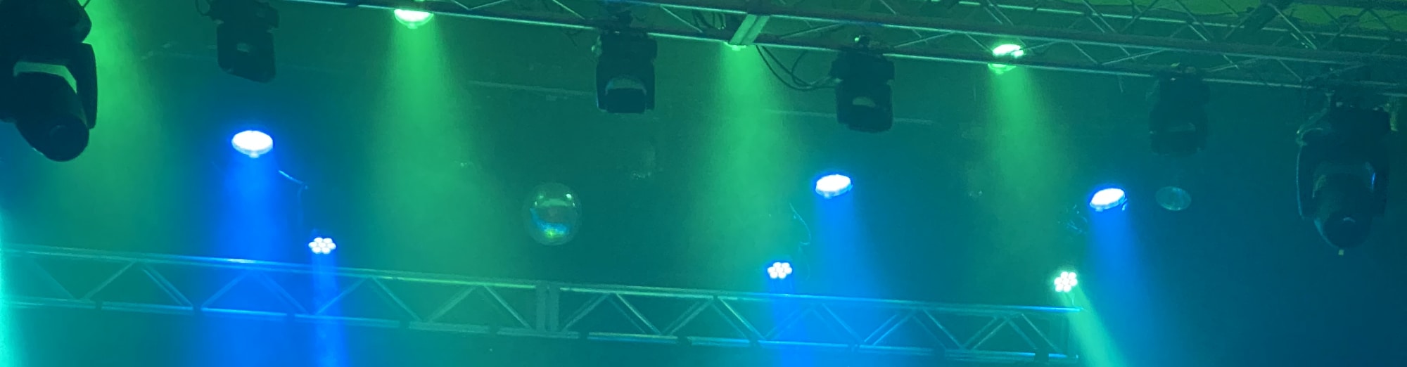 blue and green theater stage lights Albany